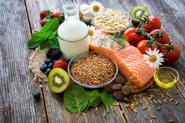 selection of healthy food on rustic wooden background