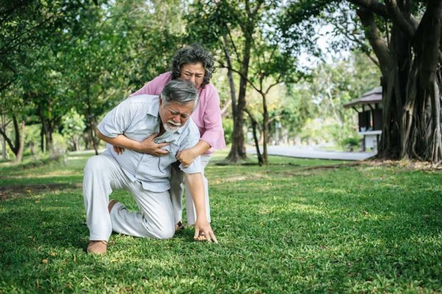 old man having a chest pain