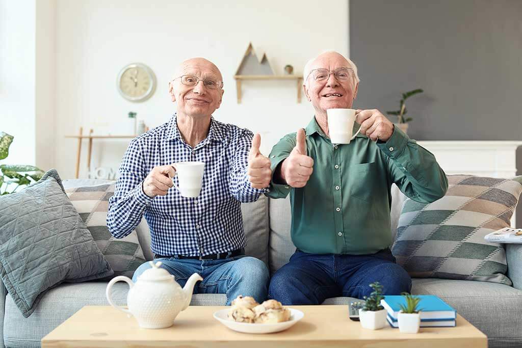 elderly men resting together at home