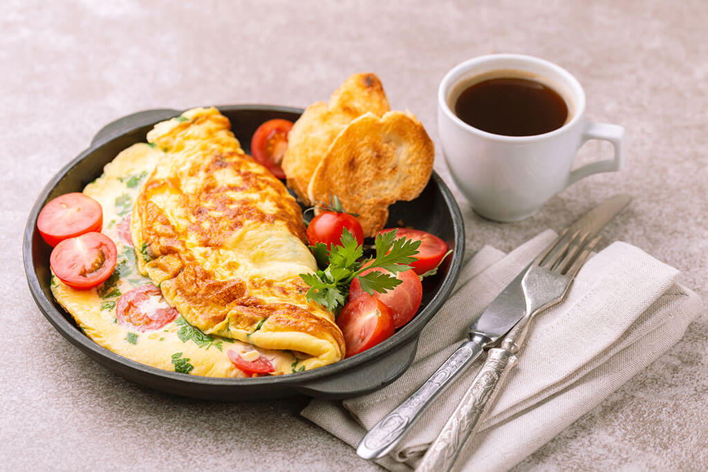 herb omelette with tomatoes and panini toasts herb omelette with tomatoes and panini toasts