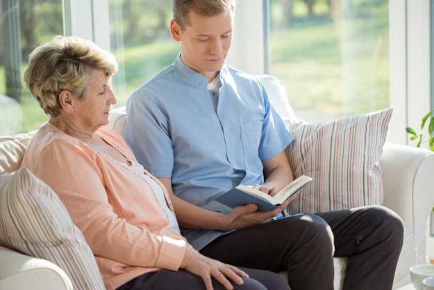 male nurse reading book