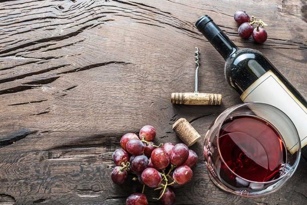 wine glass wine bottle and grapes wine glass wine bottle and grapes