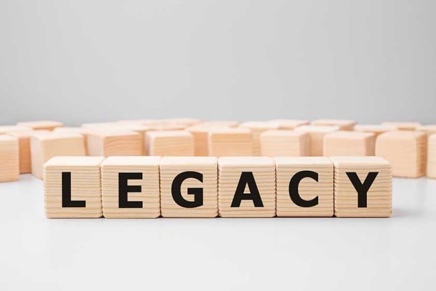 word legacy made with wood building blocks