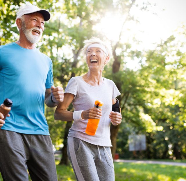 Active senior couple engaging in healthy sports activies
