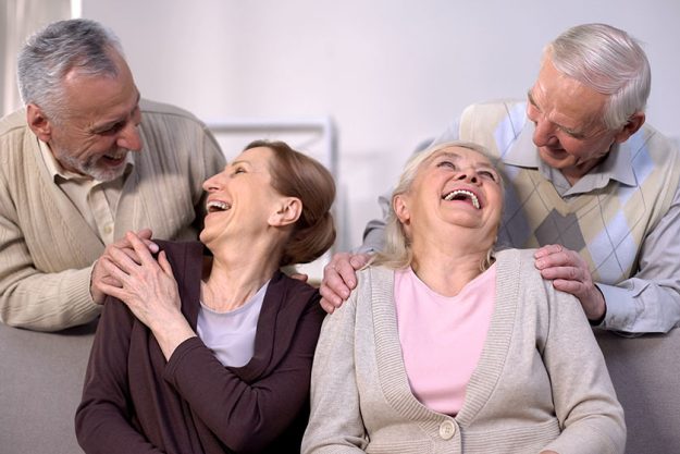 cheerful old couples laughing and having fun together cheerful old couples laughing and having fun together