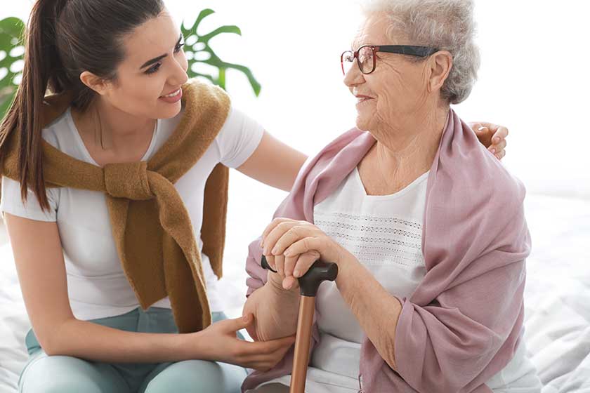 caregiver with senior woman in nursing home caregiver with senior woman in nursing home
