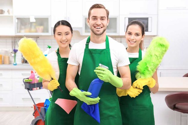 cleaning service team at work in kitchen cleaning service team at work in kitchen