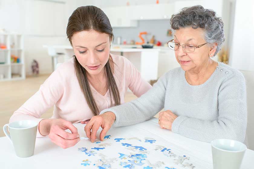 family doing memory training together with mazes and sudoku puzzles