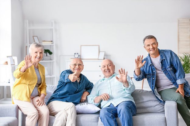 senior people sitting on sofa at senior people sitting on sofa at