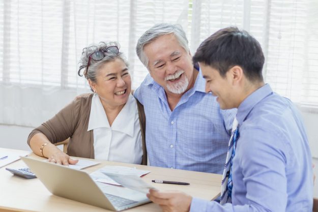 asian couple senior elder making health insurance contract