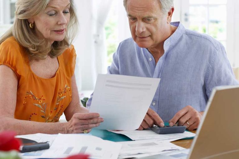 couple looking at bills