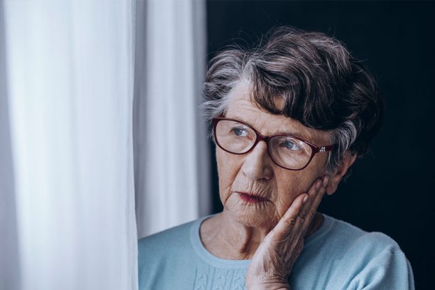 elderly woman s face with glasses