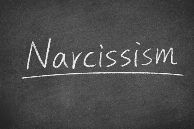 narcissism concept word on a blackboard