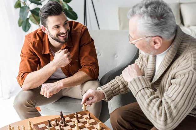 retired father glasses looking happy
