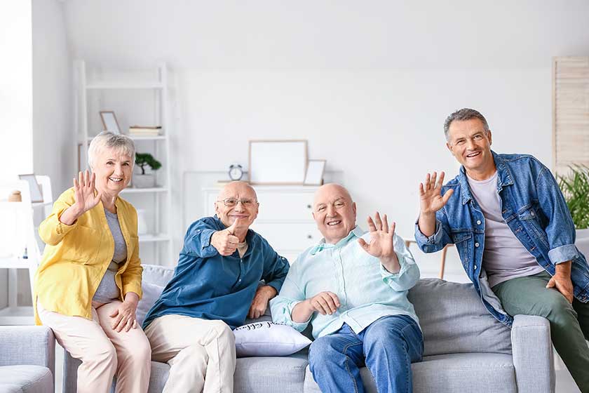 senior people sitting on sofa at home senior people sitting on sofa at home