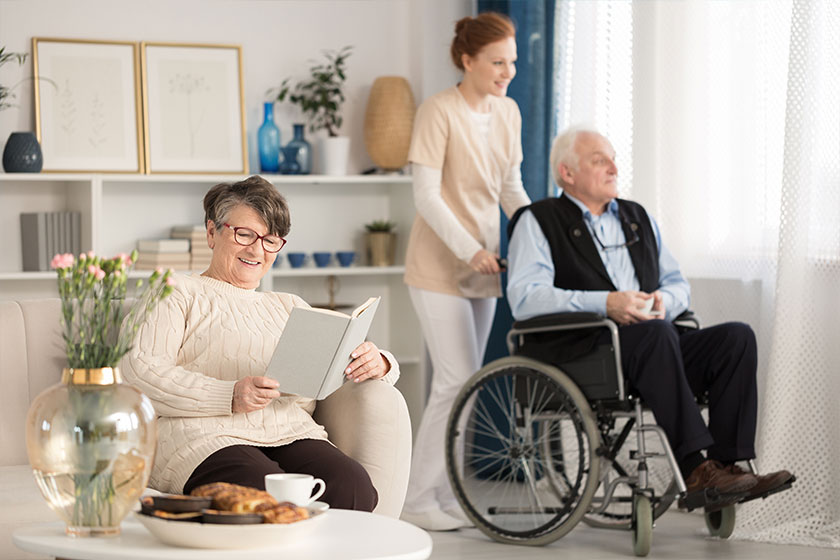 smiling senior woman reading book 1