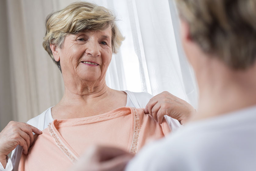woman choosing dress woman choosing dress