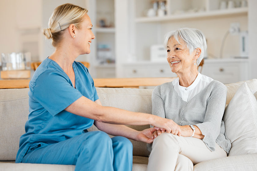 nurse caring senior woman home