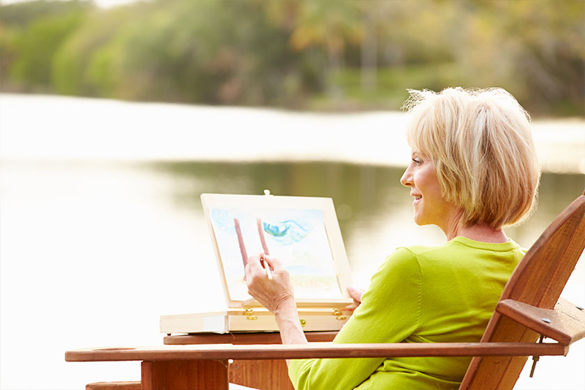 senior woman painting
