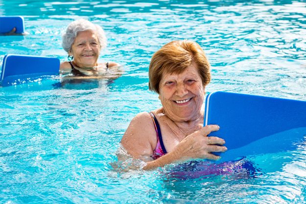 senior women doing aqua exercise