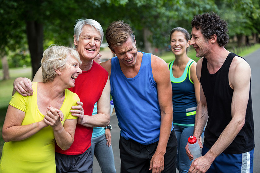marathon athletes posing and laughing