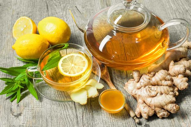 Cup of ginger tea with honey and lemon