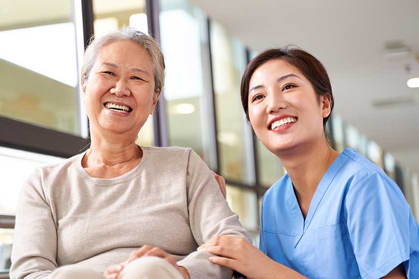 asian senior woman her caregiver
