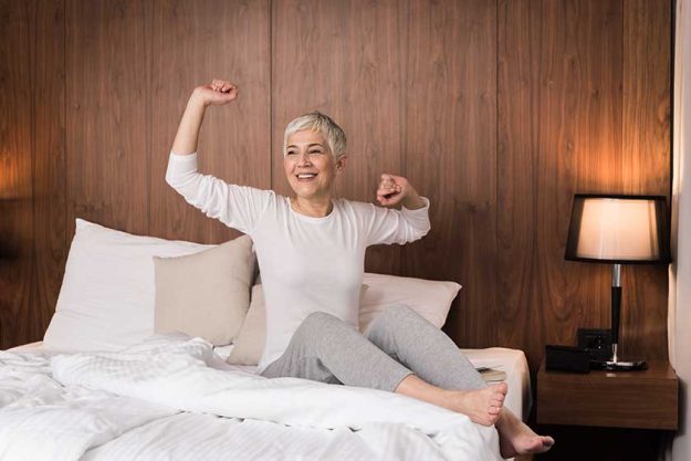 beautiful senior woman waking neck