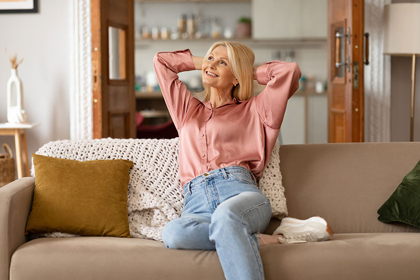 cheerful blonde mature woman sitting cheerful blonde mature woman sitting