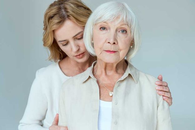 daughter hugging mother looking isolated daughter hugging mother looking isolated