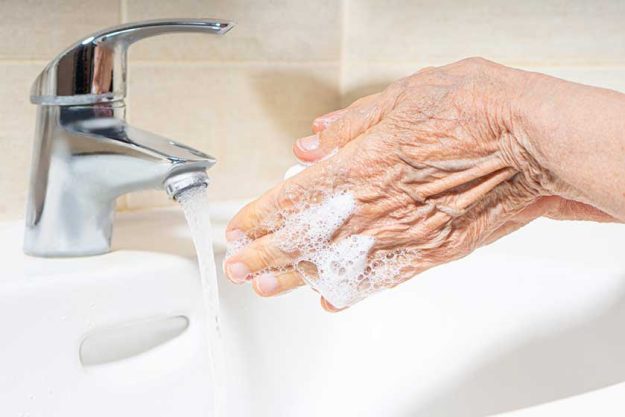 elderly woman hands washing elderly woman hands washing