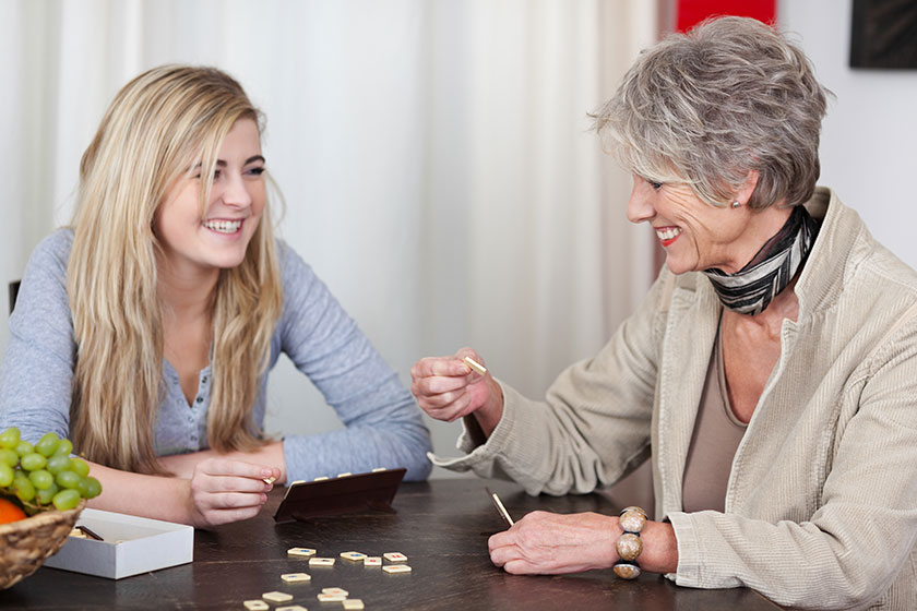 grandmother and granddaughter having fun