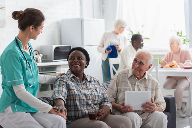 nurse holding hand smiling african nurse holding hand smiling african