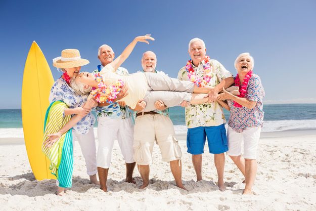 senior friends holding senior woman senior friends holding senior woman
