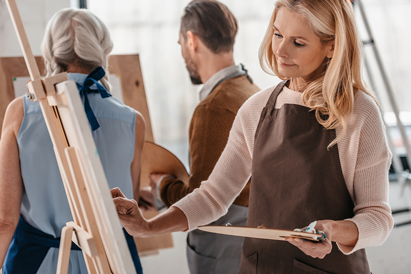 beautiful mature woman holding palette beautiful mature woman holding palette