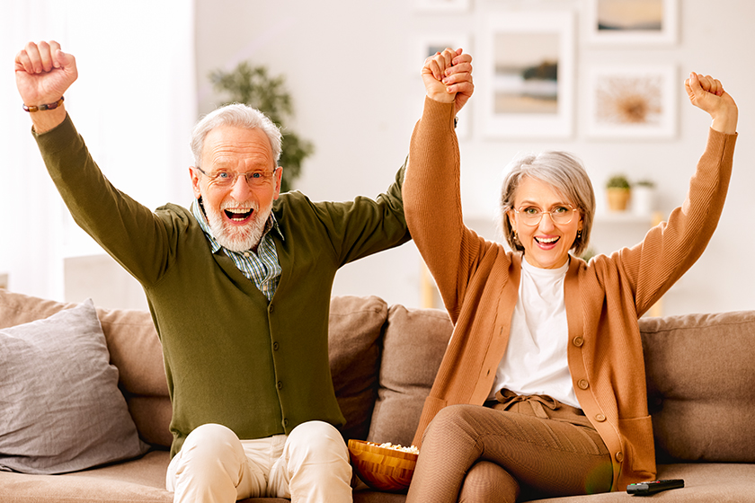 carefree senior couple using tablet carefree senior couple using tablet