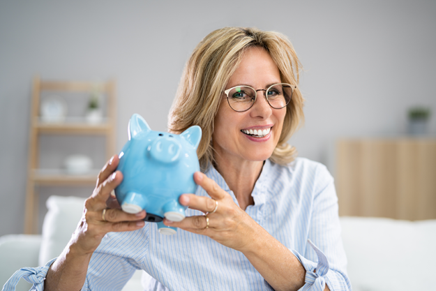 happy money saving woman piggy bank happy money saving woman piggy bank