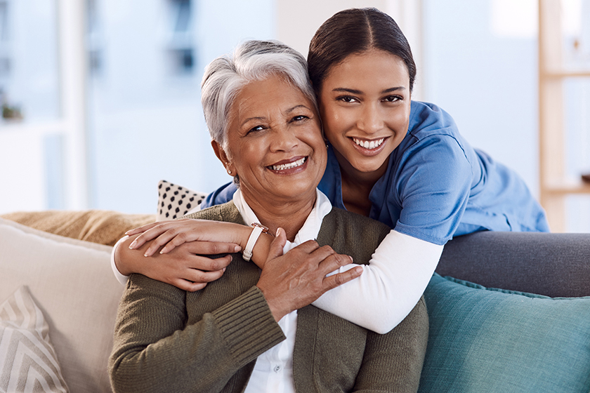 portrait smile nurse hug old