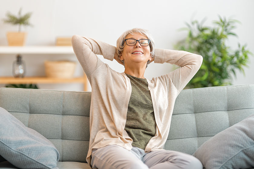 senior woman sitting sofa room