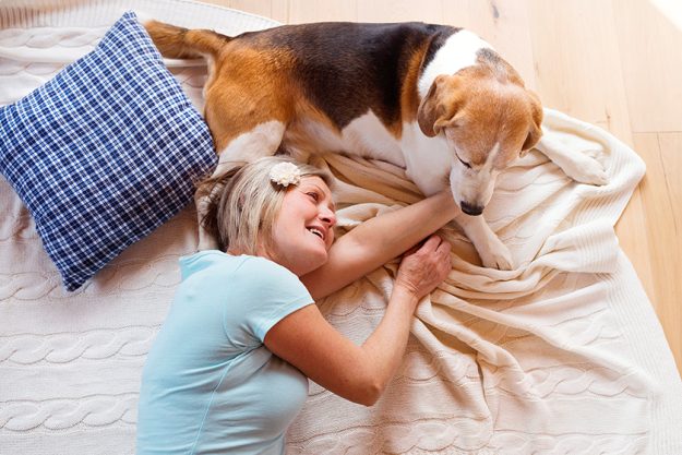 senior woman with her dog