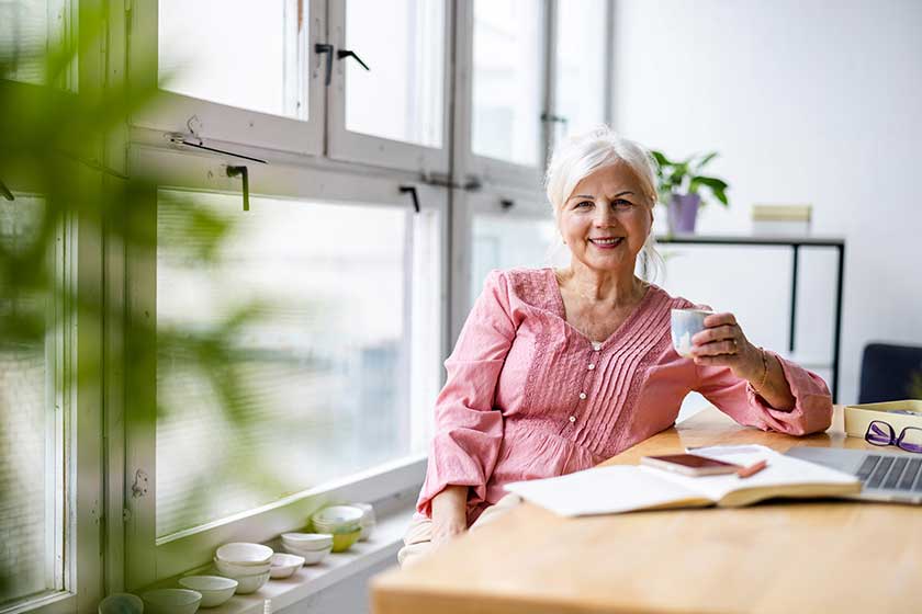 portrait smiling senior businesswoman office