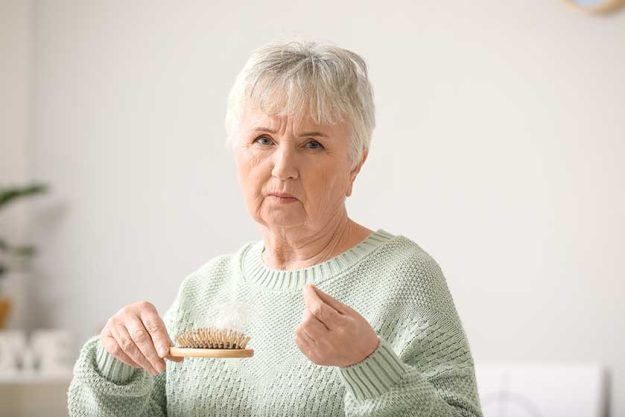 senior woman hair loss problem home