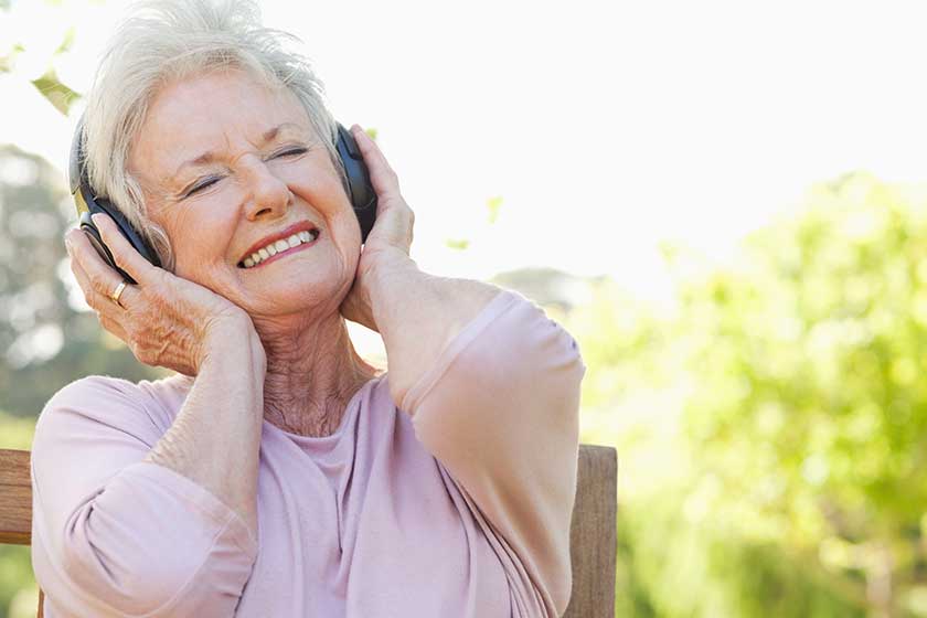 woman listening music headphones