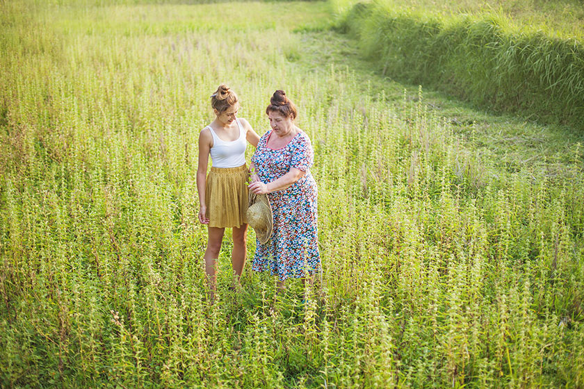 grandmother and granddaughter on the field