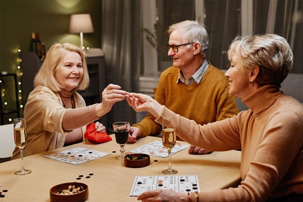 old people playing board game 