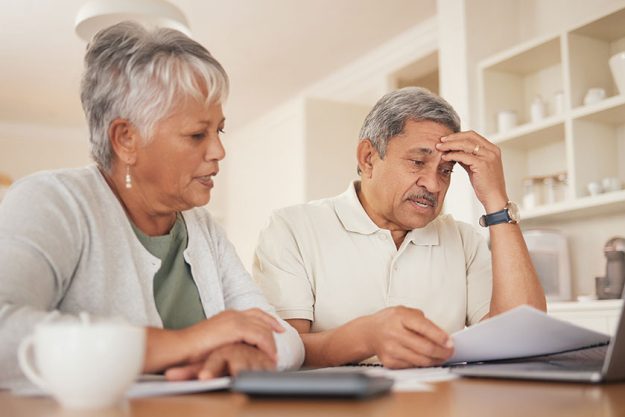 debt finance stress senior couple tech bills budget computer paperwork debt finance stress senior couple tech bills budget computer paperwork