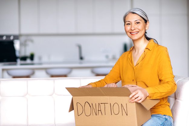 donation concept satisfied middle aged gray haired woman sitting home donation concept satisfied middle aged gray haired woman sitting home