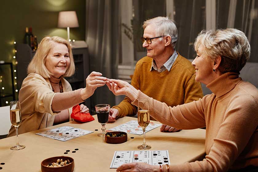 old people playing board game