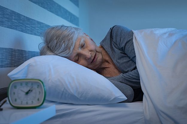 old woman grey hair sleeping peacefully night time bed senior old woman grey hair sleeping peacefully night time bed senior