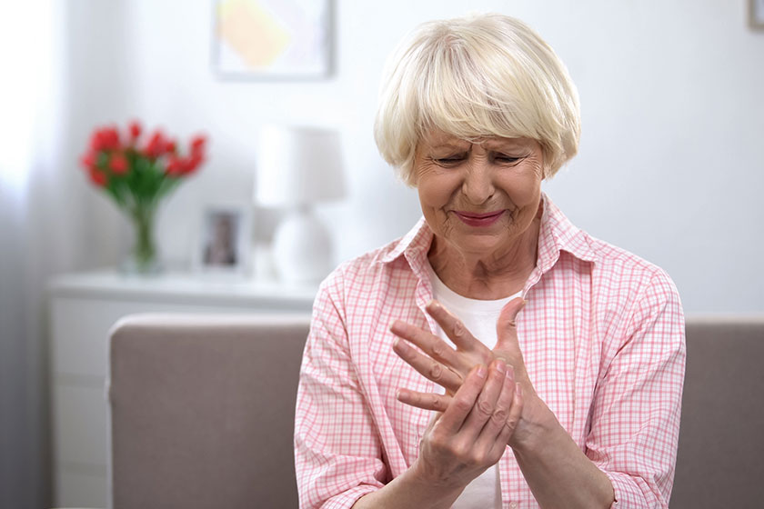 upset old woman suddenly feeling sharp pain wrist arthritis health